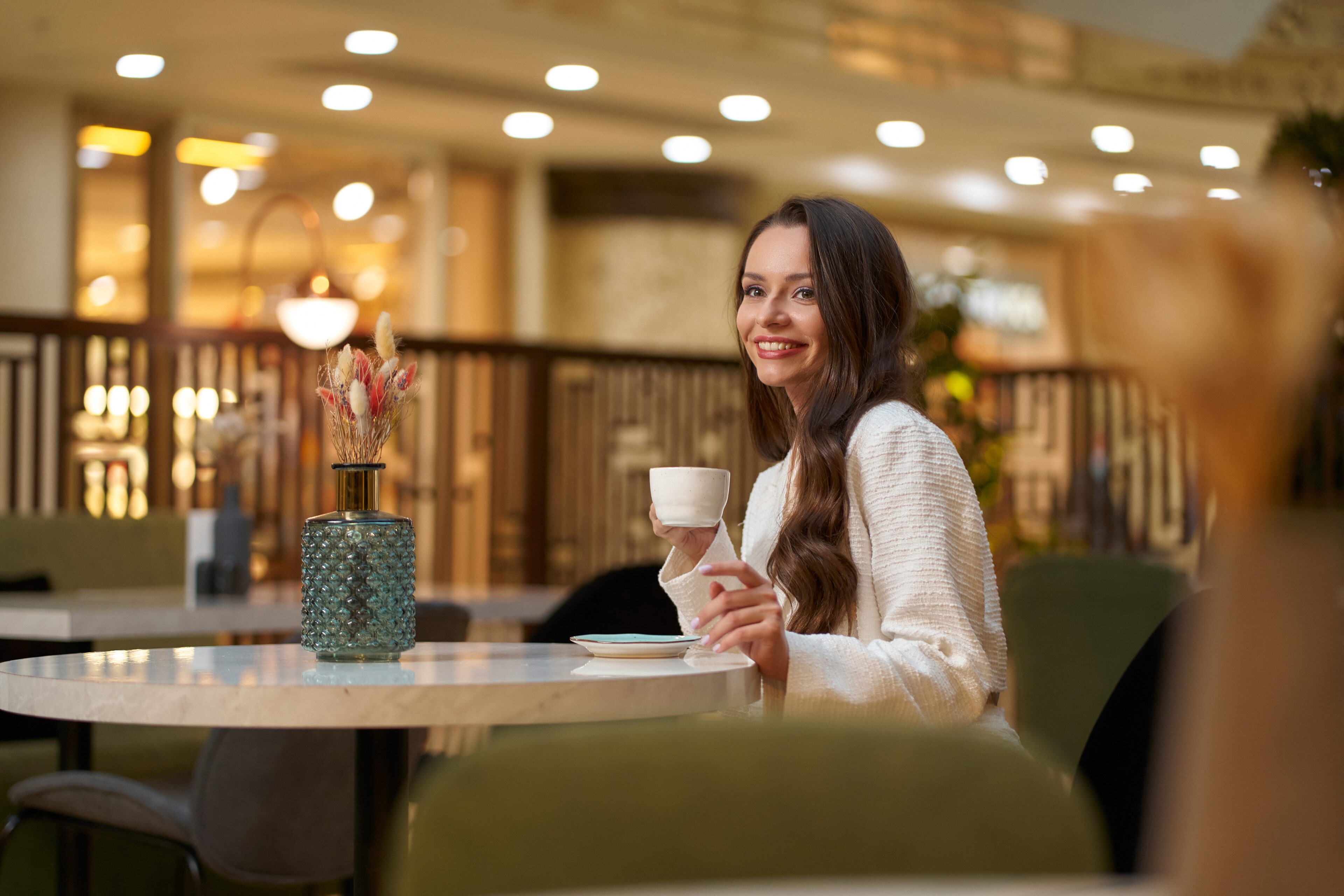 youngbeautifulstylishwomaninwhiteblazerwithcupod